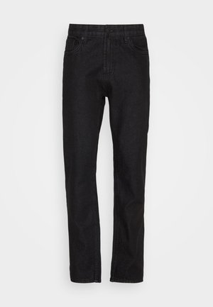 Mustad denim teksad, sirge jala disainiga, viie taskuga, nupuga ja lukuga sulgemine, millel on peen tekstuur.