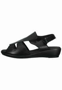 Schwarze Ledersandalen mit einem offenen Zehendesign, ausgestattete mit Ausschnitten, einem Rückengurt und einer niedrigen Keilsohle für Stabilität.