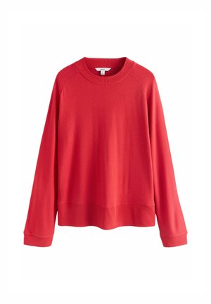 Maglione rosso con collo a girocollo a costine, maniche lunghe raglan e orlo a costine. Texture morbida e colore uniforme. Design semplice e moderno.