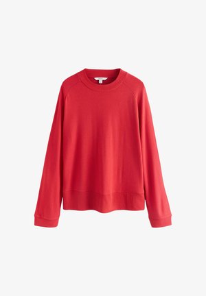 Roter Pullover mit geripptem Rundhalsausschnitt, langen Raglansleeves und geripptem Saum. Weicher Stoff und einfarbig. Einfaches, modernes Design.