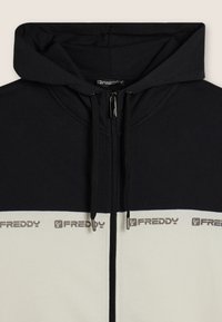 Freddy Felpa con zip - white