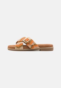Woven slide sandal with orange, beige, and brown textile straps, featuring a gold buckle accent and a flat, tan rubber sole.