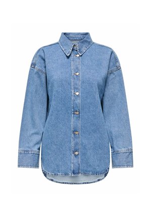 Chemise en denim bleu clair à manches longues, fermeture à boutons, col pointu, ourlet arrondi et détails de couture visibles.