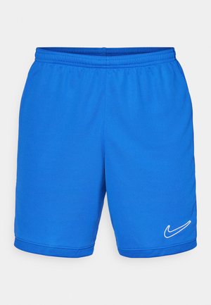 Pantaloni sportivi blu con vita elastica, realizzati in tessuto liscio. Presentano il logo Nike bianco sul lato in basso a destra e dettagli in rete.