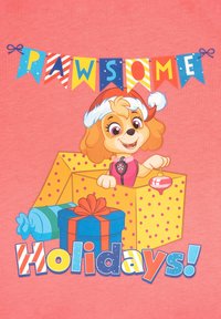 Cartoon character in a Santa hat emerges from a yellow gift box with polka dots. Text reads "PAWSOME Holidays!" against a pink background.