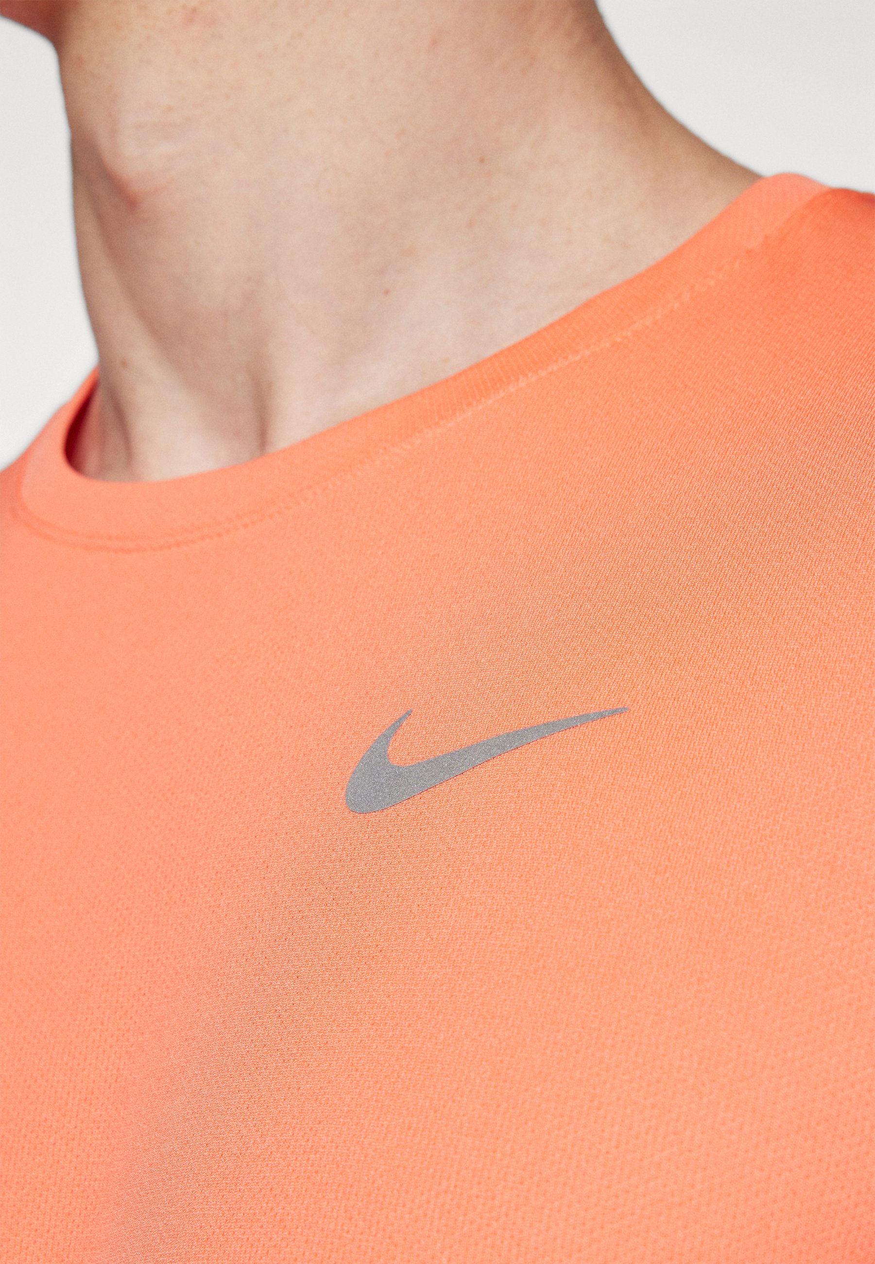 nike miler mango