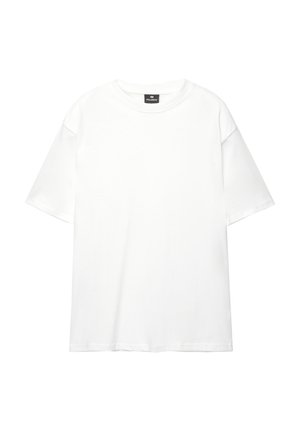 Hvid oversized t-shirt lavet af blød, glat bomuld; har korte ærmer, rund halsudskæring og et rent, uimprægneret design.