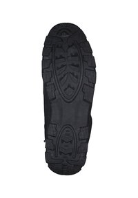 Suola in gomma nera con profonde scanalature per la trazione, dotata di un motivo testurizzato, che offre aderenza e stabilità su superfici variabili.