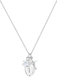 Silver chain necklace featuring three charms: a round clear crystal, a cross, and a medallion with an ornate design.