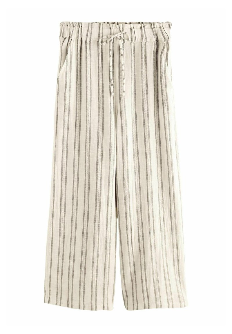 Pantalon large beige clair avec fines rayures noires verticales, taille élastique et lien à nouer à l'avant.