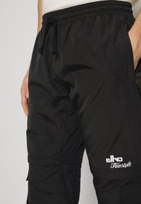 ELHO LIMONE 89 - Pantalon classique - black