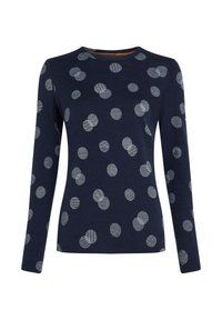 Marina långärmad tröja med vita prickar. Prickarna har texturerade ränder. Rund halsringning, mjukt tyg och figursydd form.