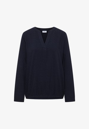 Blusa lunga blu navy con scollatura a V, orlo elastico e tessuto testurizzato. Presenta un design semplice e una leggera lucentezza.