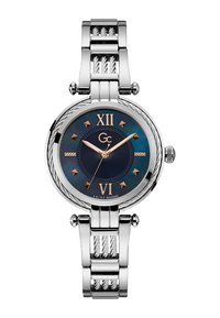 Orologio in acciaio inox argentato con quadrante blu rotondo, dettagli dorati, numeri romani alle 12 e 6, e bracciale in metallo con texture.