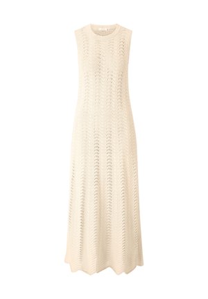 Vestido sin mangas de punto en un color crema claro, con un patrón de ondas y una silueta fluida de largo hasta el tobillo con un dobladillo redondeado.