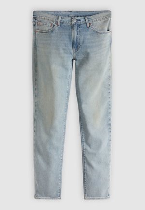 Světlé modré džíny z denimu s klasickým střihem, pět kapes, zapínání na knoflíky a jemné vyblednutí pro ležérní vzhled.