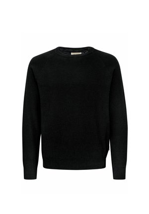 Juodas megztinis su apvali iškirpte, ilgomis rankovėmis ir raukšlėta tekstūra. Yra raglan rankovės ir subtilus prekės ženklo etiketė šone.