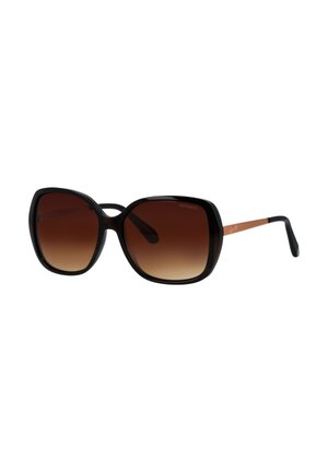 Übergroße schwarze Sonnenbrille mit braunen Verlaufsgläsern und dünnen braunen Bügeln mit schwarzen Spitzen vor weißem Hintergrund.