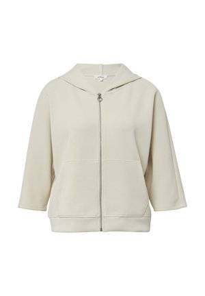 Jasno beżowy polar z zamkiem, wykonany z miękkiego, strukturalnego materiału. Posiada kaptur i rękawy do łokcia z bocznymi kieszeniami. Minimalistyczny design.