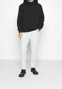 Filippa K Kapuzenpullover - black