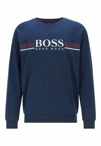 Sudadera azul marino de algodón, con cuello redondo, mangas largas y un logo blanco con franjas de acento rojas y azules en el pecho.