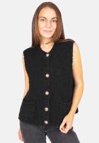 Schwarze ärmellose Weste aus weichem, strukturiertem Material, versehen mit goldfarbenen Knöpfen und zwei Fronttaschen für zusätzliche Details.