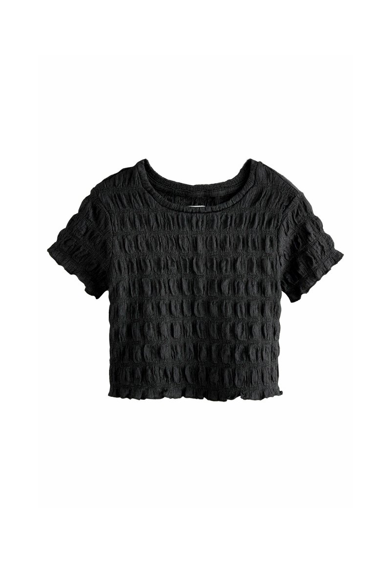 Zwart cropped t-shirt van textuurstof met een golfpatroon. Heeft een ronde halslijn en korte mouwen met een raw edge zoom.