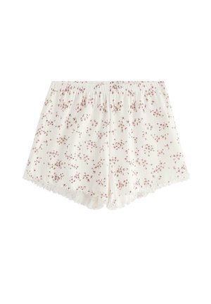 Vita blomstrande shorts med rynkade midja och scalloped nederkant. Har små rosa och vinröda blommor på ett texturerat tyg.