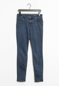 Tmavě modré úzké džíny z denimu s pěti kapsami, poutky na opasek a zipovým zapínáním. Hladký povrch a mírné vyšisování u kapes.