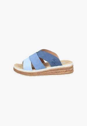 Blue suede wedge sandal with two-tone straps, cork-textured sole, and cushioned beige footbed, side view on white background.