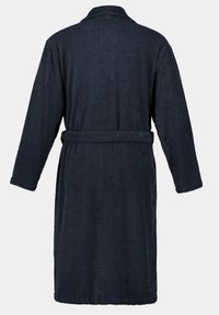 Navyblauwe badjas van badstof, met lange mouwen, een sjalkraag en een tailleband voor sluiting. Zacht, gestructureerd stof.