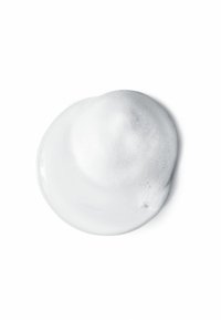 Thick, white foam with a smooth, glossy surface, displayed on a white background, featuring small bubbles and a slightly textured edge.