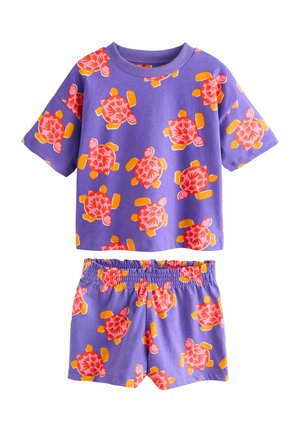 Purple cotton short set featuring a round-neck T-shirt and elastic waist shorts, both adorned with pink and orange turtle patterns.
