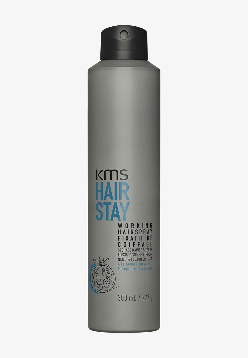 Grijze harenlak in blikvorm met het etiket "KMS Hair Stay", zwarte dop en tomaatillustratie, inhoud 300 ml / 222 g.