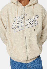 Karl Kani Giacca in pile - beige