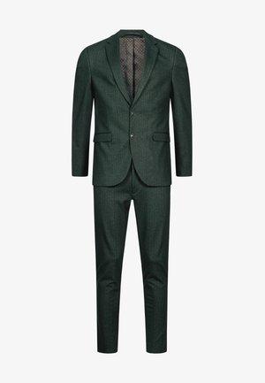 Dark green textured suit with a single-breasted jacket, notch lapels, and matching trousers; interior features a contrast polka dot lining.