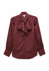 Burgundy blouse with white polka dots. Features a tied bow at the neck, buttoned front, and gathered sleeves for a structured shape.