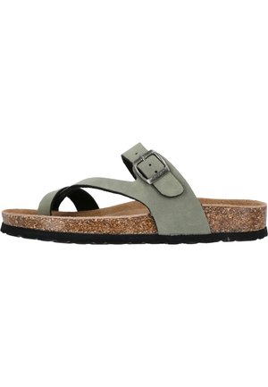 Vihreät mokkanahkaa slingback-sandaalit, joissa on korkkipohja, ristikkäin kulkeva hihnadekorointi, metallinen solki ja musta kumipohja.