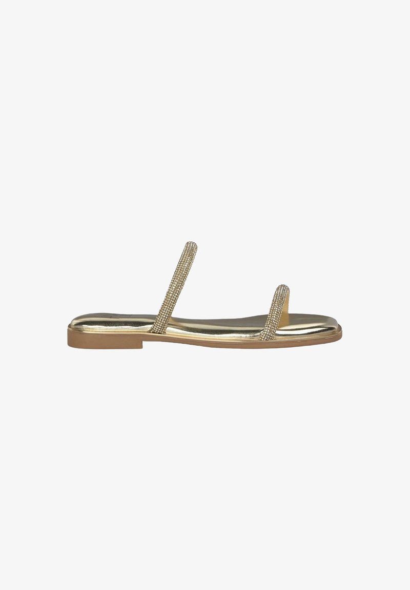 Goldene flache Sandale mit zwei dünnen Riemen mit Strassakzenten, einem glatten metallischen Finish und einer niedrigen flachen Sohle.