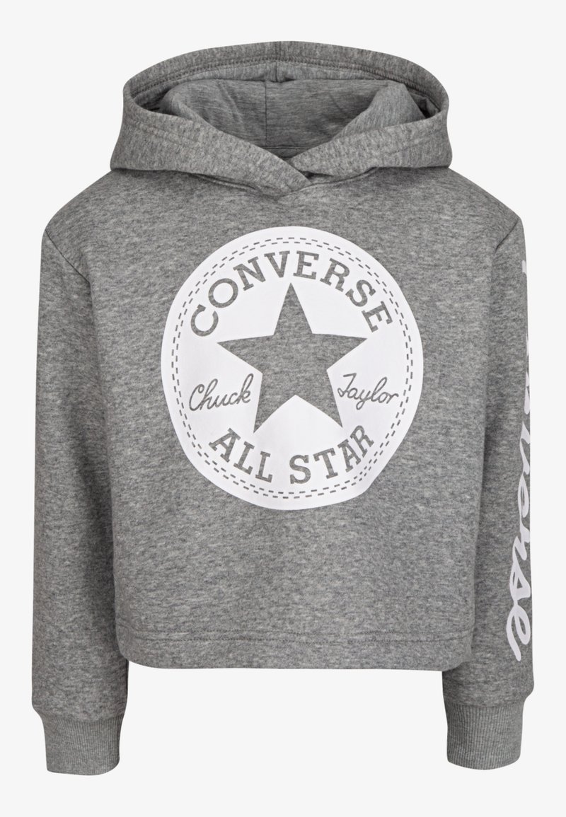 Sweat à capuche gris avec un logo blanc circulaire Converse All Star et le texte "Chuck Taylor" à l'avant.