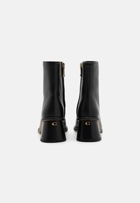 COACH GIGI BOOTIE - Classic ankle boots - black