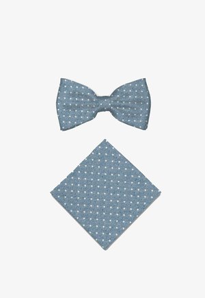 Blue bow tie and matching pocket square with white polka dots arranged on a white background.