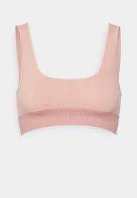 Vaaleanpunainen bralette, joka on valmistettu pehmeästä kankaasta. Siinä on neliön muotoinen kaula-aukko ja ribbikuvioitu vyötärönauha lisätuen tarjoamiseksi.