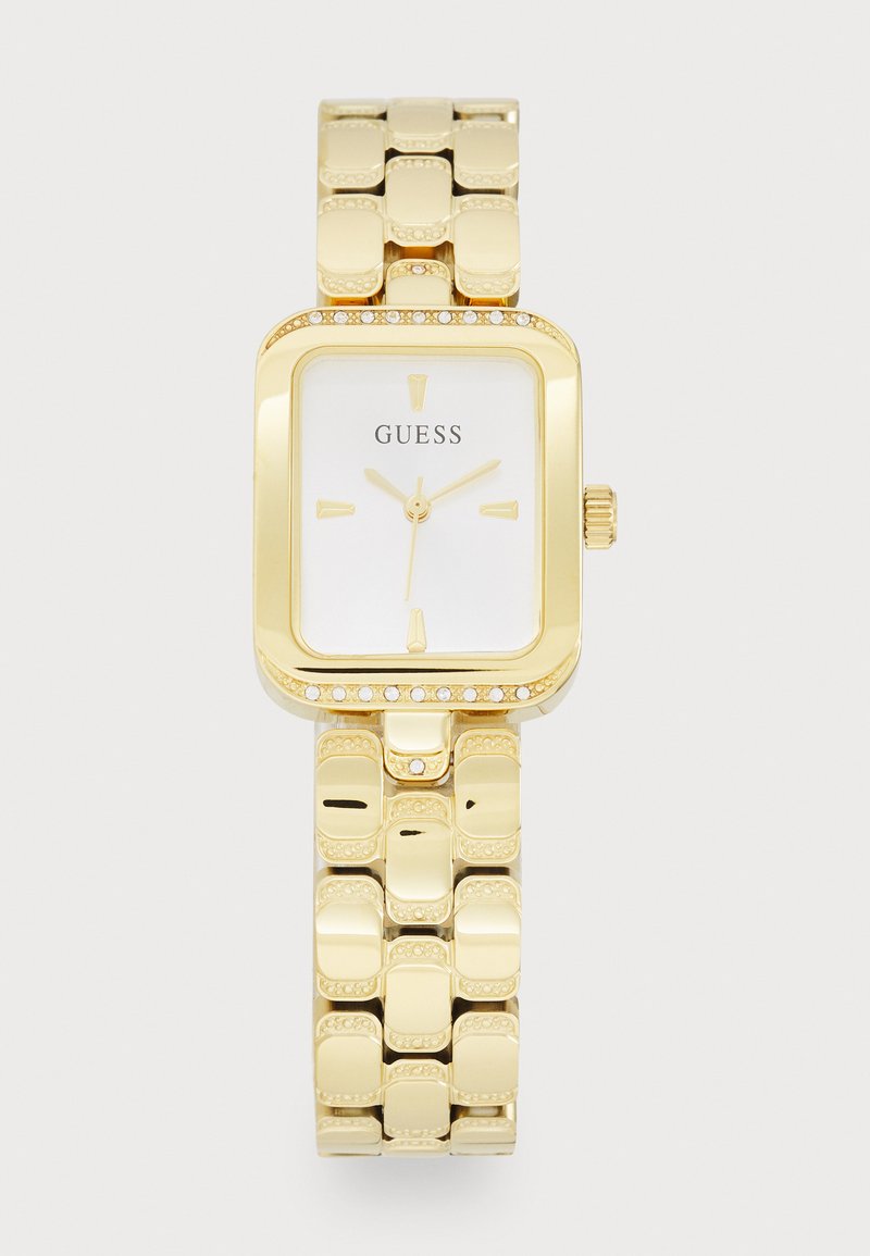 Gold-tone rectangular watch featuring a white dial, gold hour markers, a diamond-like accent around the bezel, and a chunky link bracelet.