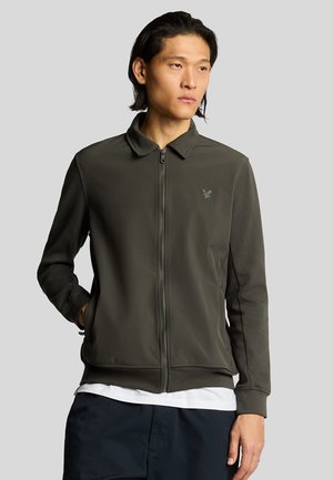 Green zip-up jacket with a collar, featuring a slim fit, smooth texture, and a small logo on the chest. Long sleeves and ribbed cuffs.