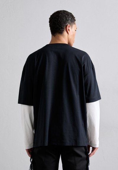 Études DOUBLE SLEEVE - Pikkade varrukatega topp - black