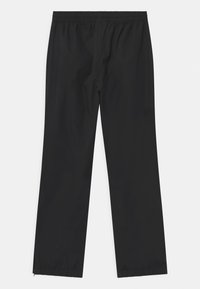 Zwarte rechte broek met elastische taille en ritssluitingen aan de onderkant, weergegeven tegen een witte achtergrond.