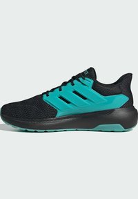 Chaussures de sport noires avec une tige en mesh respirant, des accents turquoise, un design à trois bandes et une semelle noire texturée.