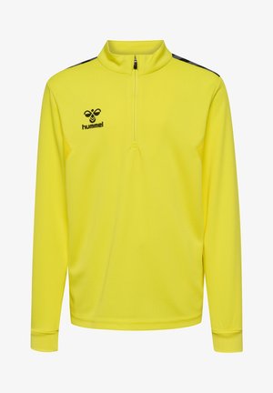 Langærmet sportsbluse med lynlås i strålende gul med en tekstureret finish; har sorte accenter og et logo på brystet.