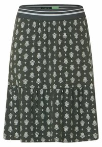 Grüner Rock mit gemustertem, gestuftem Design und weißen blumenähnlichen Motiven. Elastischer Bund mit grauen und weißen Streifen. Weiche Textur.